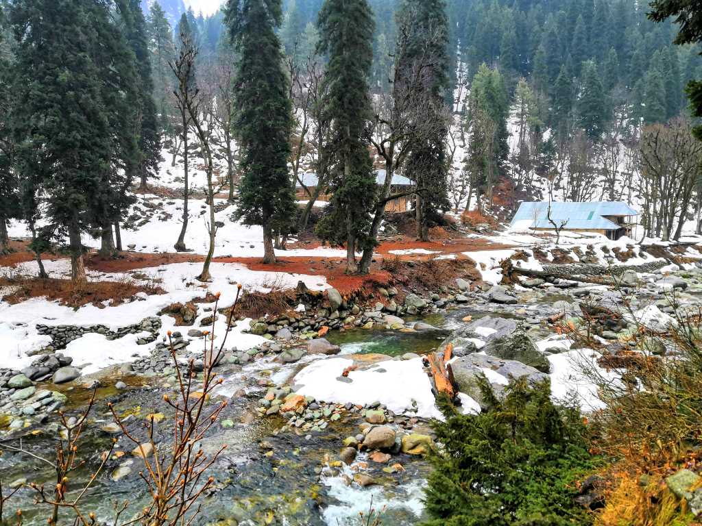 Hut and River view during Naranaag trek on Kashmir trip by Eka Experiences