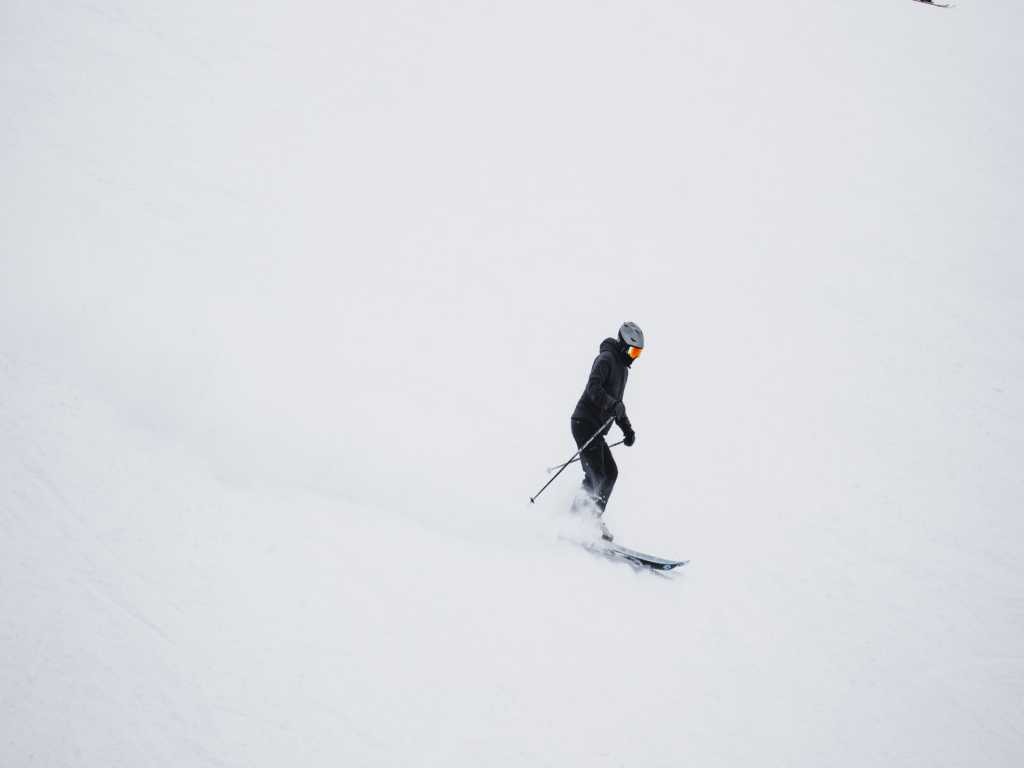 skier going down a snow slope