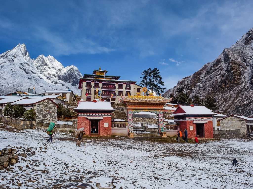 Monastery with snow-covered mountains in nepal