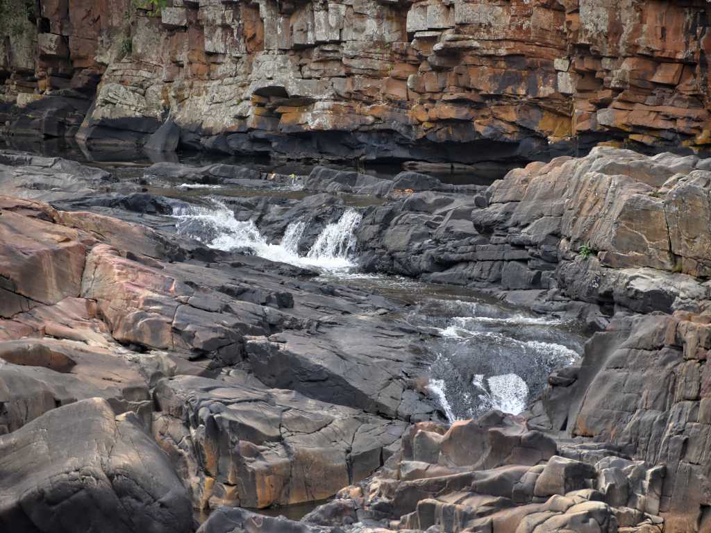 water cascading down a canyon