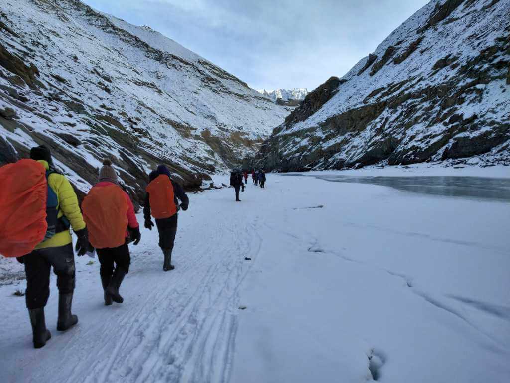 Trekkers walking during Chadar Trek Ladakh India_Eka Experiences