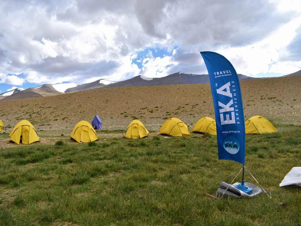 Eka camp tents and company flag_Ladakh Trek