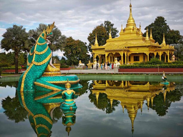 Dragon statue and reflection of Golden Pagoda of Namsai Arunachal Pradesh Tour_Eka Experiences