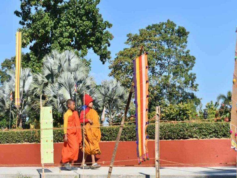 Young monks in range robes at Golden Pagoda of Namsai Arunachal Pradesh Tour_Eka Experiences
