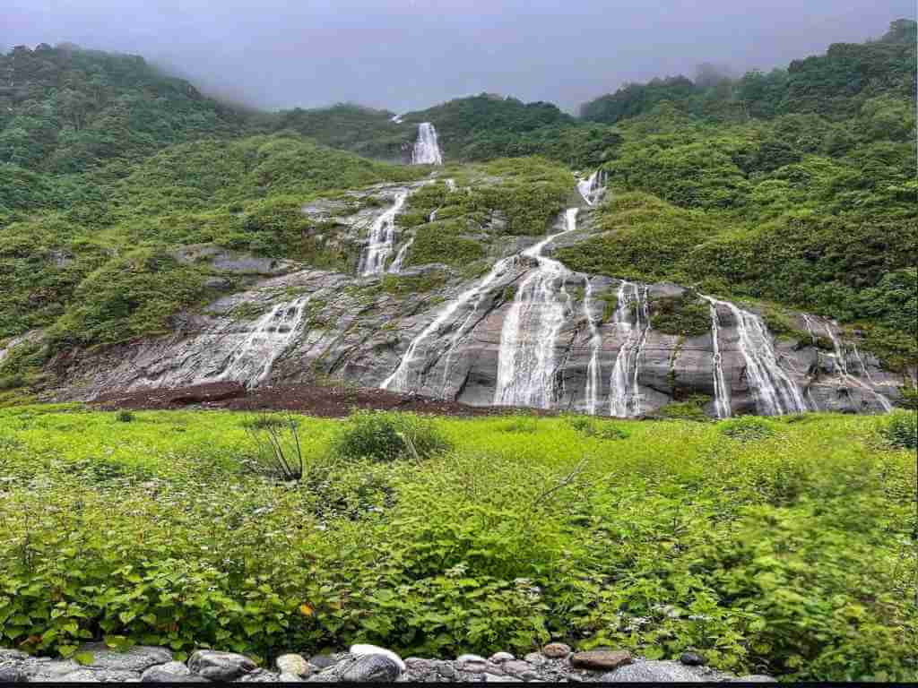 Wide Waterfalls on Colossal rocky hills on Dibang Valley Tour__Eka Experiences™